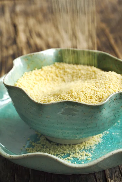 Couscous grains in bowl. — Stock Photo, Image
