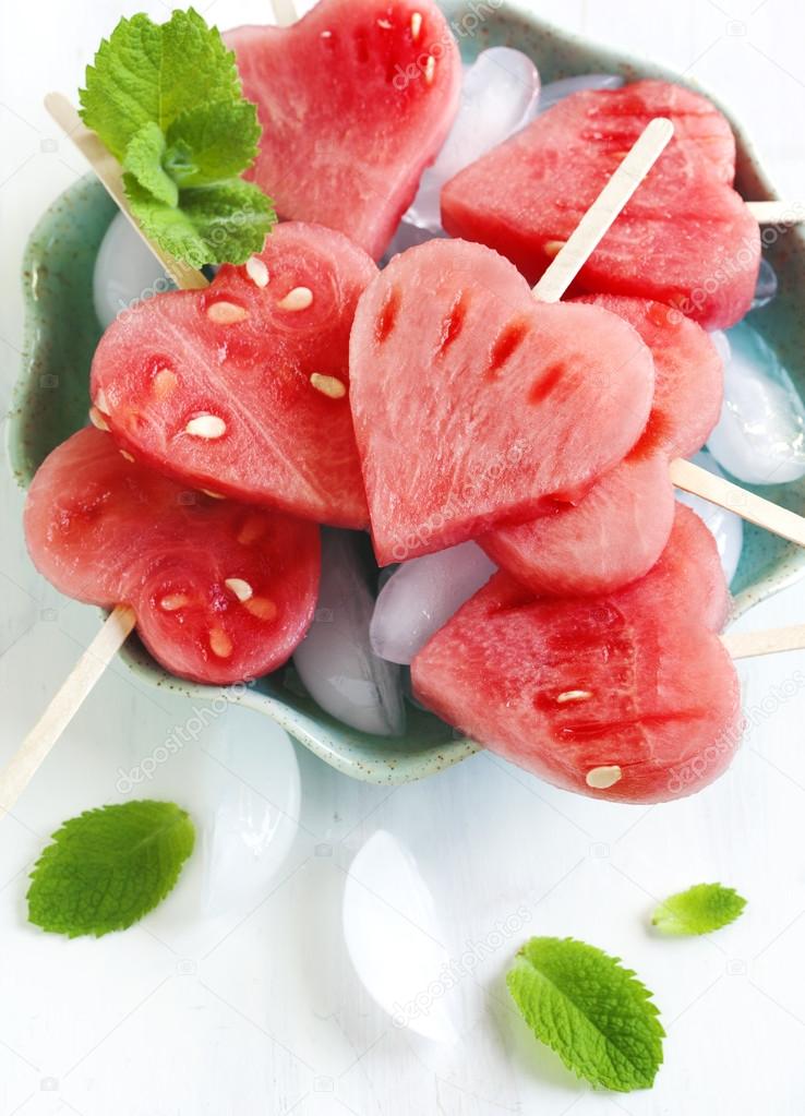 Watermelon Pops. Watermelon slices cut into heart shape pieces.