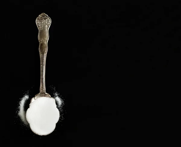 Vintage Silver Spoon of Sugar on Black Background — Stock Photo, Image