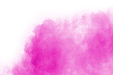Soyut pembe toz sıçramış arkaplan, patlayan renk tozunun hareketsiz hareketi / renk pudrası, beyaz arkaplanda renk parıltısı dokusu.