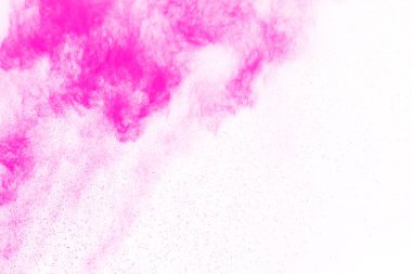 Soyut pembe toz sıçramış arkaplan, patlayan renk tozunun hareketsiz hareketi / renk pudrası, beyaz arkaplanda renk parıltısı dokusu.