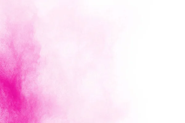 Abstract pink powder splatted background,Freeze motion of color powder exploding/throwing color powder,color glitter texture on white background.