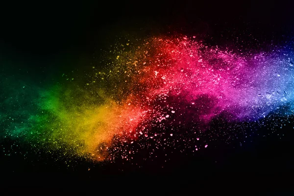 abstract colored dust explosion on a black background.abstract powder splatted background,Freeze motion of color powder exploding/throwing color powder, multicolored glitter texture.