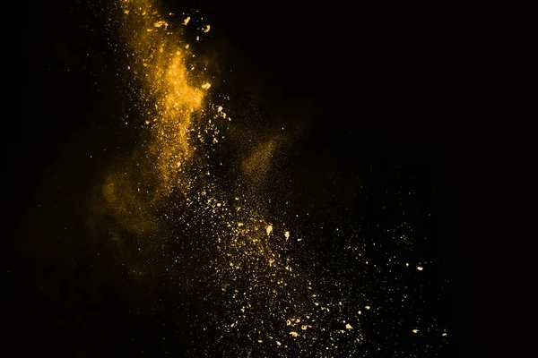 abstract orange powder splatted background,Freeze motion of color powder exploding/throwing color powder,color glitter texture on black background