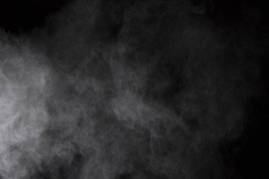 Siyah arka planda beyaz toz patlaması. Renkli bulut. Renkli toz patlar. Boya Holi.