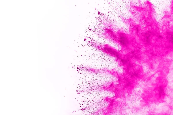 Soyut pembe toz sıçramış arkaplan, patlayan renk tozunun hareketsiz hareketi / renk pudrası, beyaz arkaplanda renk parıltısı dokusu.