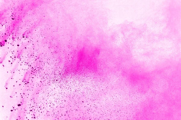 Abstract pink powder splatted background,Freeze motion of color powder exploding/throwing color powder,color glitter texture on white background.