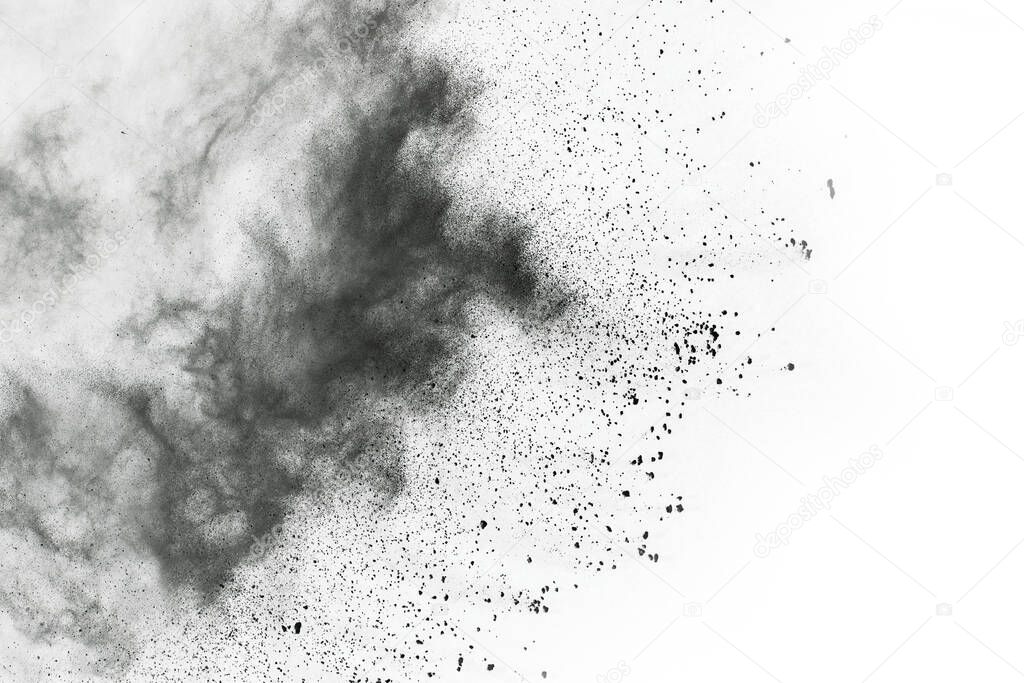 particles of charcoal on white background,abstract powder splatted on white background,Freeze motion of black powder exploding or throwing black powder.