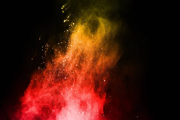 abstract colored dust explosion on a black background.abstract powder splatted background,Freeze motion of color powder exploding/throwing color powder, multicolored glitter texture.