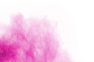Soyut pembe toz sıçramış arkaplan, patlayan renk tozunun hareketsiz hareketi / renk pudrası, beyaz arkaplanda renk parıltısı dokusu.
