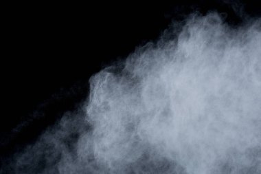 Siyah arka planda beyaz toz patlaması. Renkli bulut. Renkli toz patlar. Boya Holi.