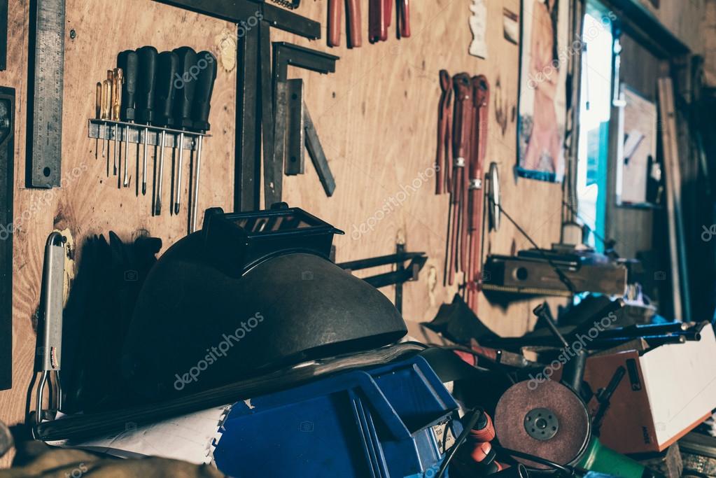 Welding mask in carpenter's workplace Stock Photo by ©ysbrand 103525232
