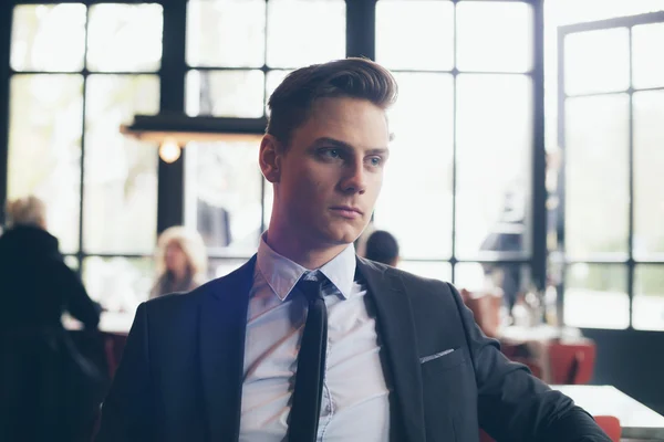 Young businessman in cafe — Stock Photo, Image