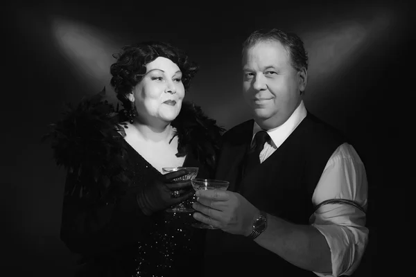 Vintage 1940s couple holding glass — Stock Photo, Image