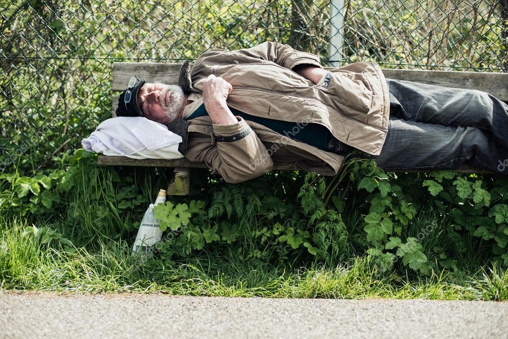 Homeless Man Sleeping On Bench Stock Photo Image By C Ysbrand