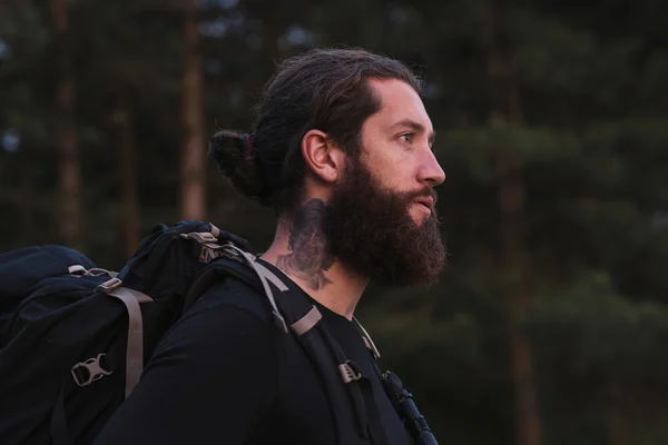 Profile of backpacker with beard — Stock Photo, Image