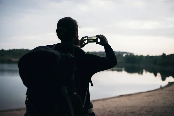 Silhuett av hiker ta bilder — Stockfoto