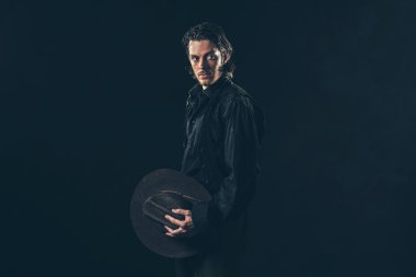 Vintage kovboy holding şapkası 