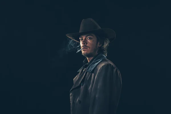 Retro cowboy smoking cigarette — Stock Photo, Image