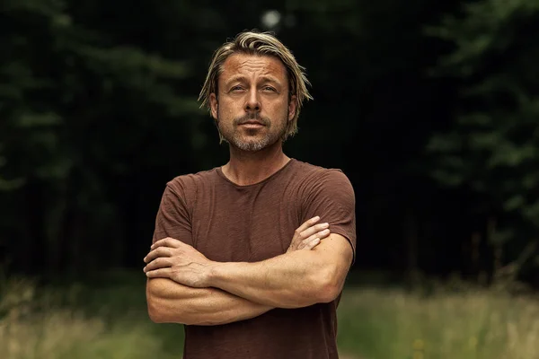 Blonde Man His Arms Folded Stubble Beard Brown Shirt Forest — Stock Photo, Image