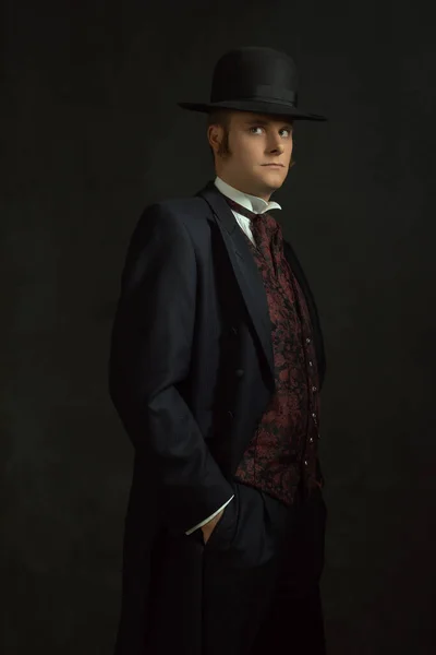 Young Man Stylish Vintage Victorian Attire Stands Room Front Dark — Stock Photo, Image