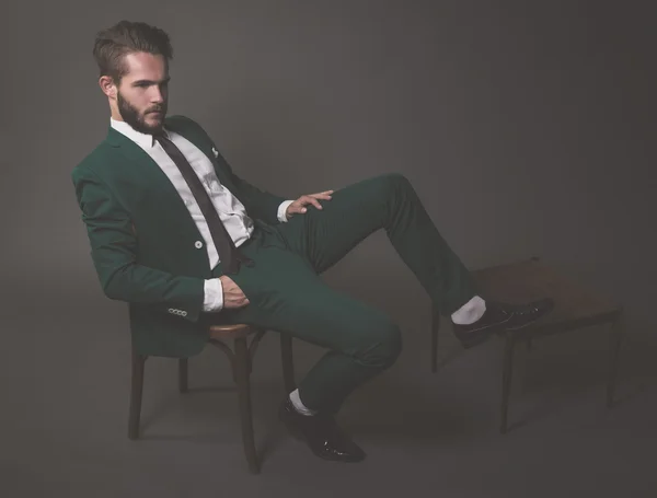 Business fashion man wearing green suit with white shirt black a — Stock Photo, Image