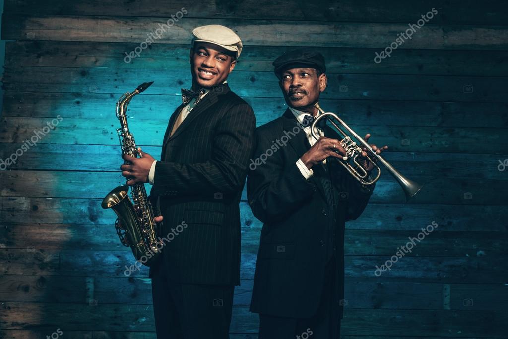 Two Vintage African American Jazz Musicians With Trumpet And Sax Stock Photo C Ysbrand 57988239 https depositphotos com 57988239 stock photo two vintage african american jazz html