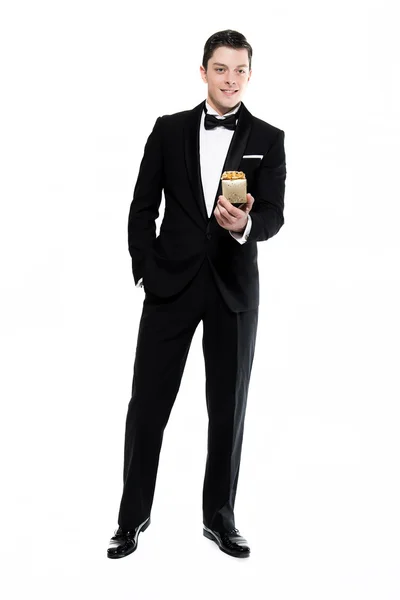 New year's eve moda mężczyzna noszenia smokingu czarny. Gospodarstwo — Zdjęcie stockowe