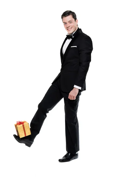 New year's eve fashion man wearing black dinner jacket. Balancin — Stock Photo, Image