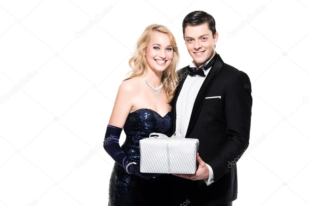 Romantic new year's eve fashion couple wearing black dinner jack