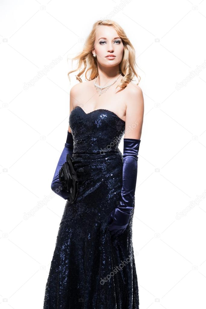 New year's eve fashion woman with blonde hair wearing dark blue 