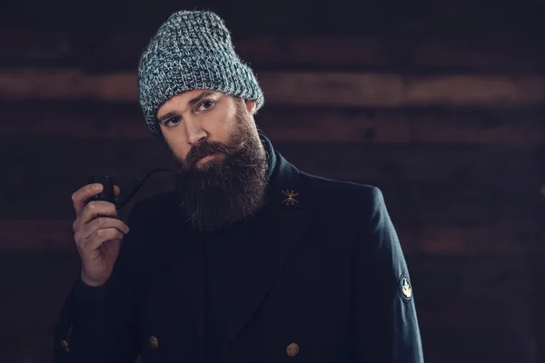 Man in Coat and Bonnet — Stock Photo, Image