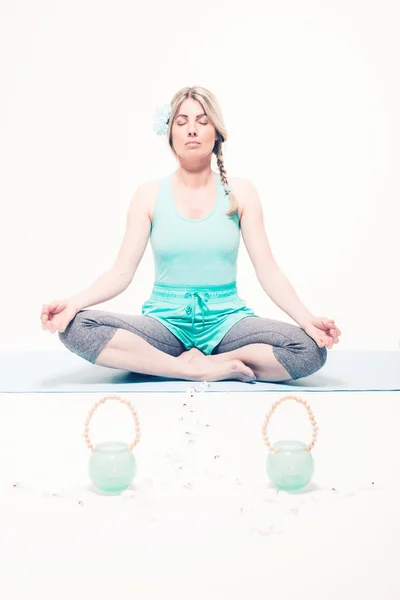 Woman meditating with a peaceful expression — Stock Photo, Image