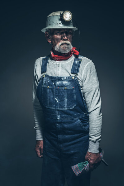 Standing Senior Male Miner