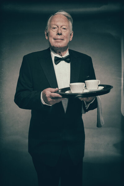 Male Butler Wearing Formal Tuxedo Suit