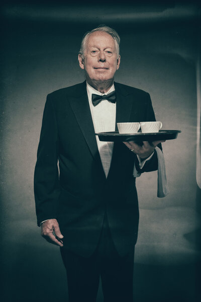 Male Butler Wearing Formal Tuxedo Suit