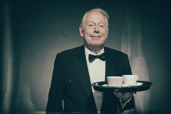 Male Butler Wearing Formal Tuxedo Suit