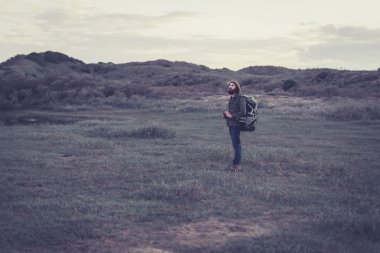Lonely backpacker in a remote wilderness