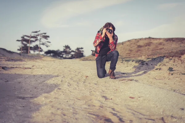 Photographer taking a photo of the camera — 스톡 사진