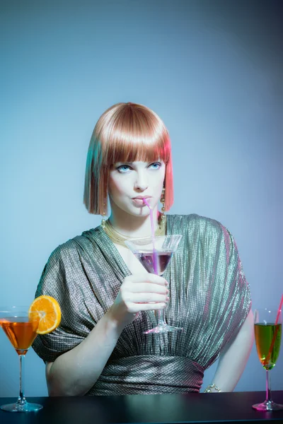 Glamorous Woman Sipping Cocktail — 图库照片