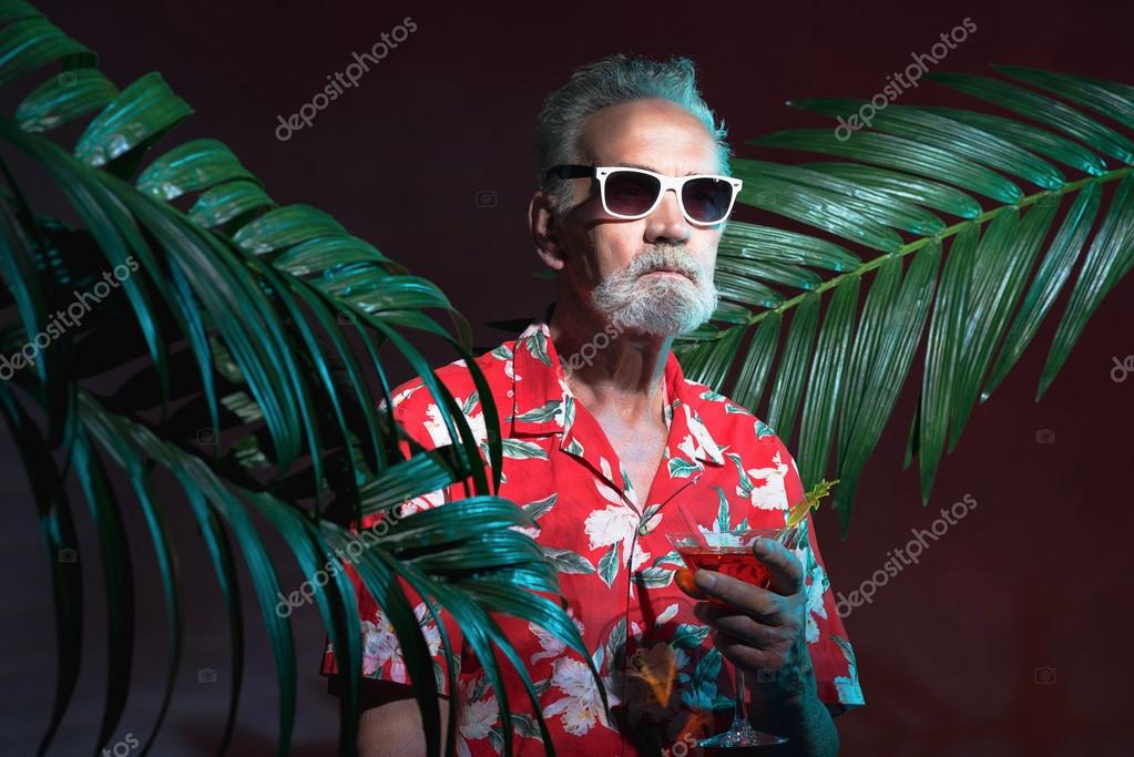 Old Man in Beach Outfit Stock Photo by ©ysbrand 78394792