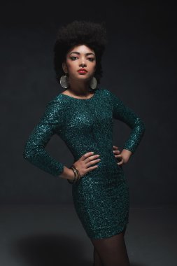 Woman Posing in Sparkling Green Dress