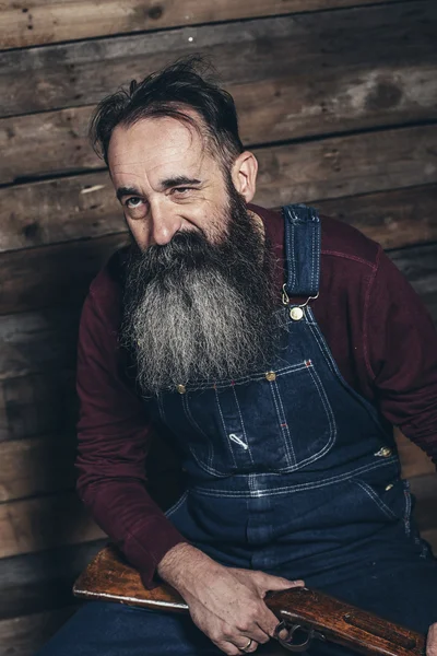 Vintage çiftçi holding tüfek