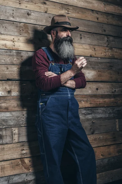 Vintage worker man with beard — Stock Photo, Image