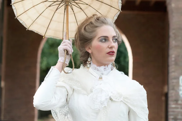 Victorian fashion girl with umbrella — Zdjęcie stockowe