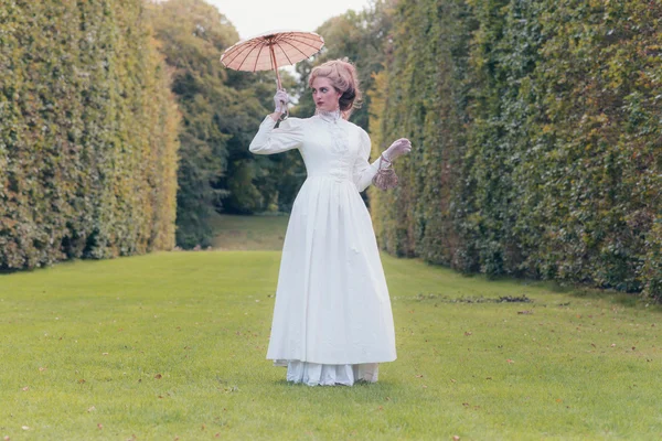 Victorian fashion woman holding parasol — Stock Fotó