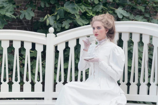 Tea drinking victorian woman — Stock Photo, Image