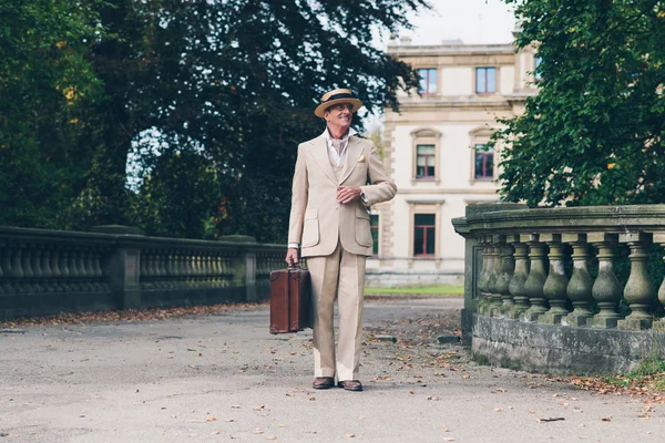 Vintage commercial traveler leaving Stock Photo