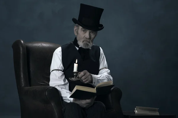 Dickens Scrooge Man Sitting — Stock Photo, Image