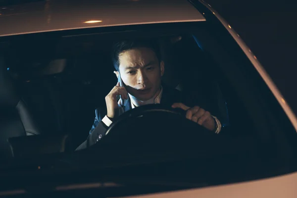 Young asian businessman calling — Stock Photo, Image